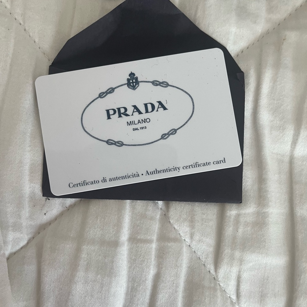 Brand new alabaster pink bucket hat wore once purchased October 10 has id cards